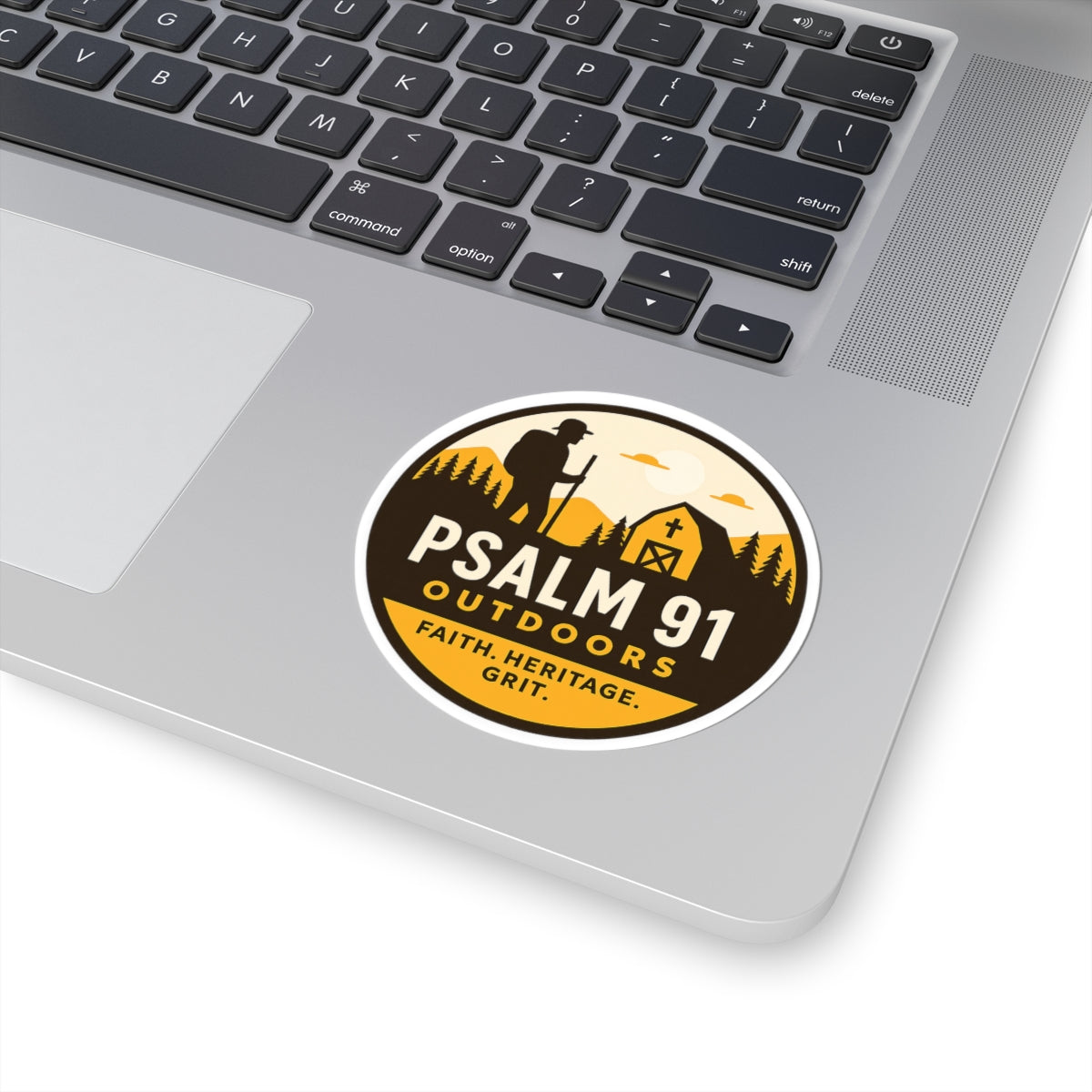 Laptop with a 'Psalm 91 Outdoors' sticker on the palm rest area