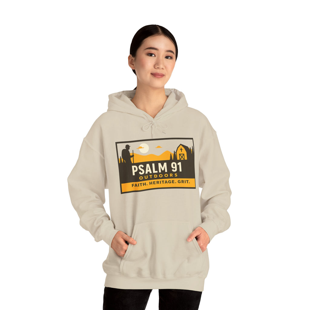 Person wearing a beige hoodie with 'Psalm 91 Outdoors' logo on a white background