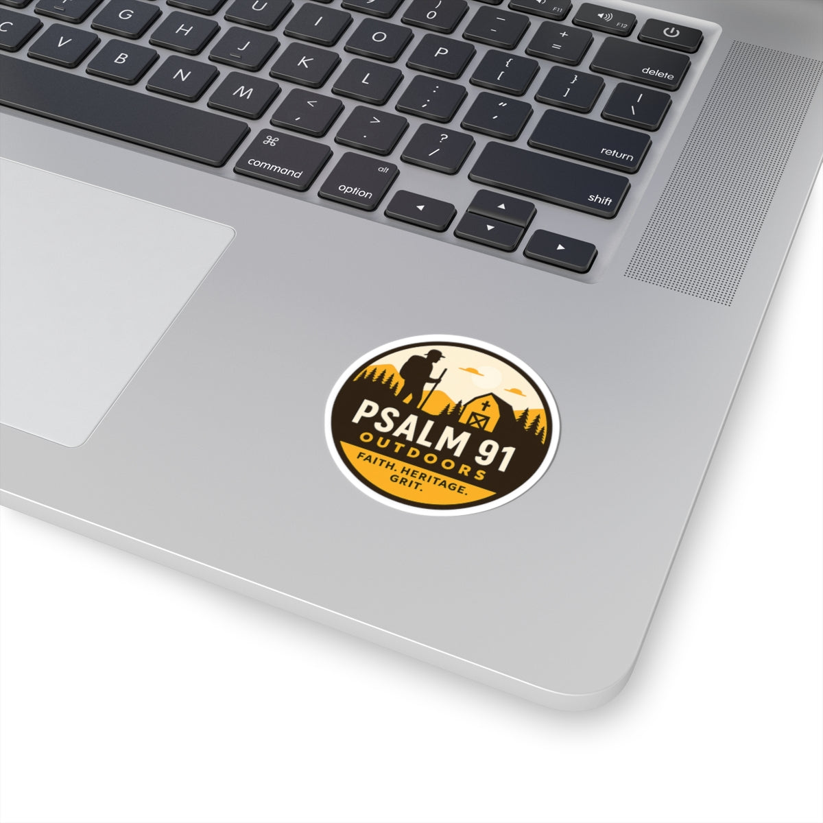 Laptop with a 'Psalm 91 Outdoors' sticker on the palm rest area